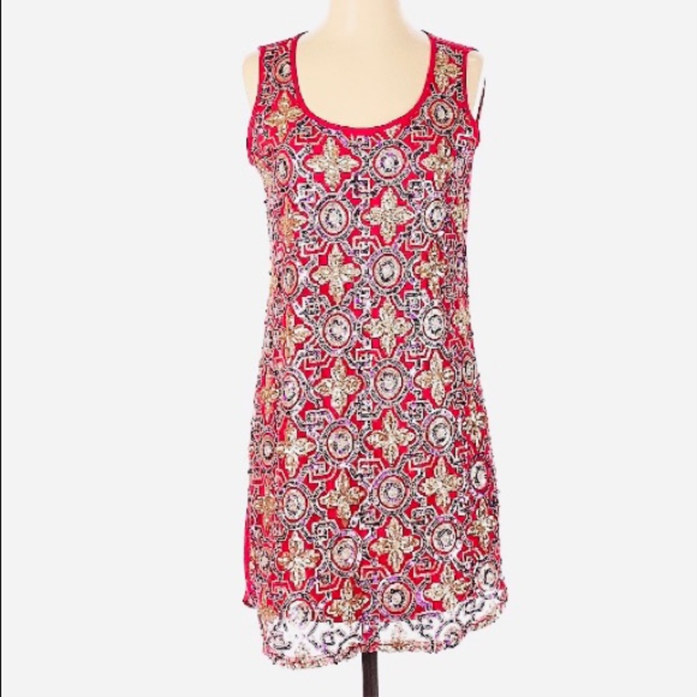Buttons sleeveless red shift dress with gold sequin geometric pattern.